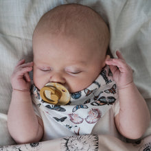 Load image into Gallery viewer, sleeping baby with soother wearing gender neutral butterfly patterned bib