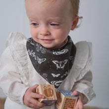 Load image into Gallery viewer, toddler wearing black bib / black patterned bib
