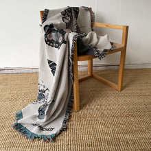 Load image into Gallery viewer, luxury moth print cotton throw blanket draped over a chair
